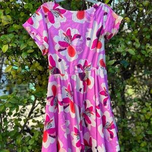 Tea brand pink floral dress with capped sleeve and back cutout